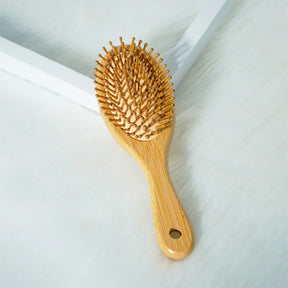 Escova Bamboo Femme – Massagem Capilar Natural & Estilo Sustentável