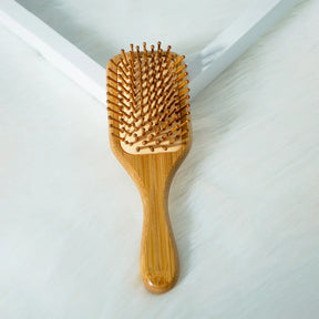 Escova Bamboo Femme – Massagem Capilar Natural & Estilo Sustentável